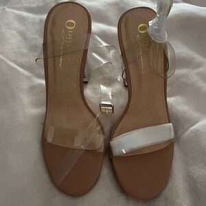 Miss Lola Tan and Clear Heels